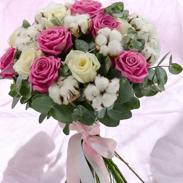 Bouquet to offer with roses and cotton flowers