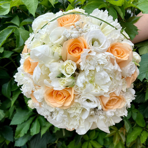 Bridal bouquet of peonies and roses