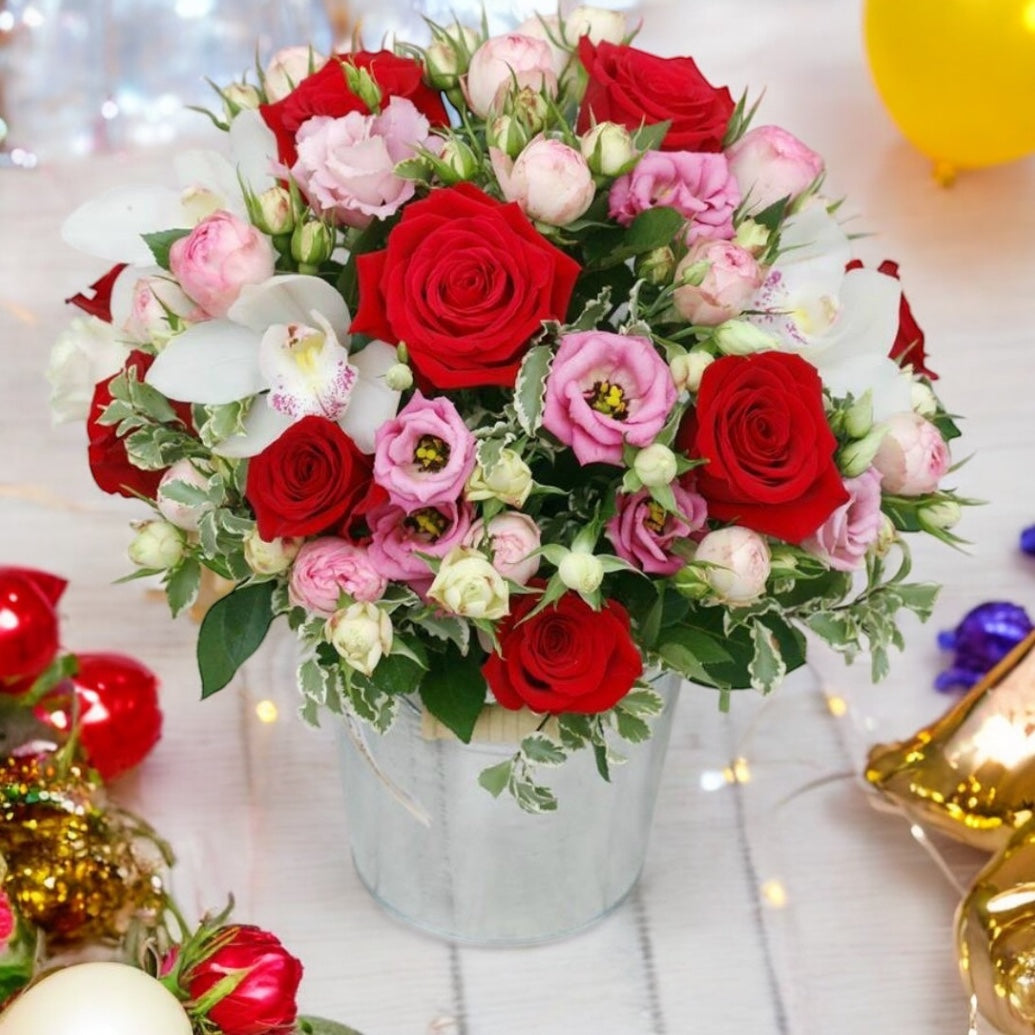 Floral arrangement red roses and imperial orchid