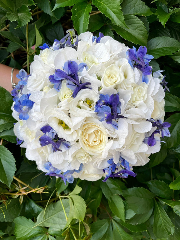Special bridal bouquet with hydrangea, delphinium and lisianthus