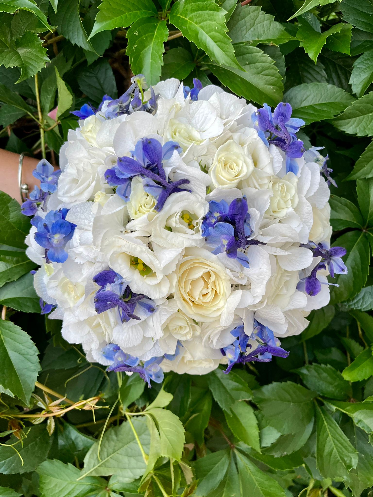 Special bridal bouquet with hydrangea, delphinium and lisianthus