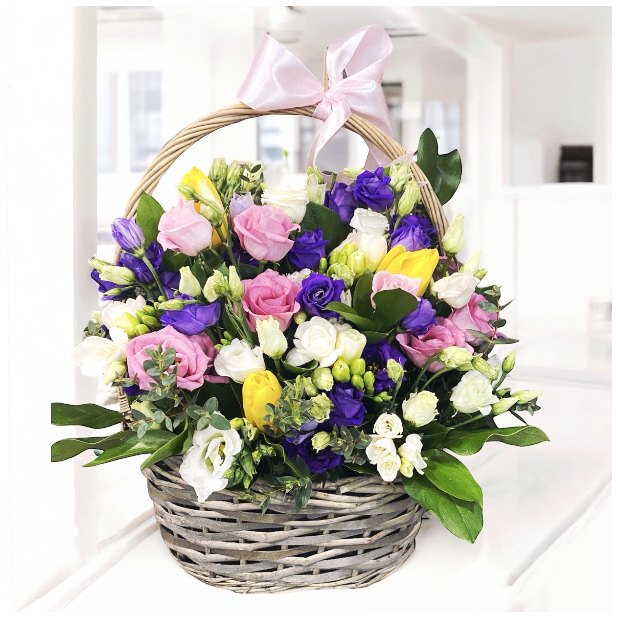 Colorful basket - mix of spring flowers