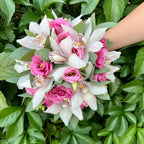 Cymbidium and pink lisianthus wedding bouquet