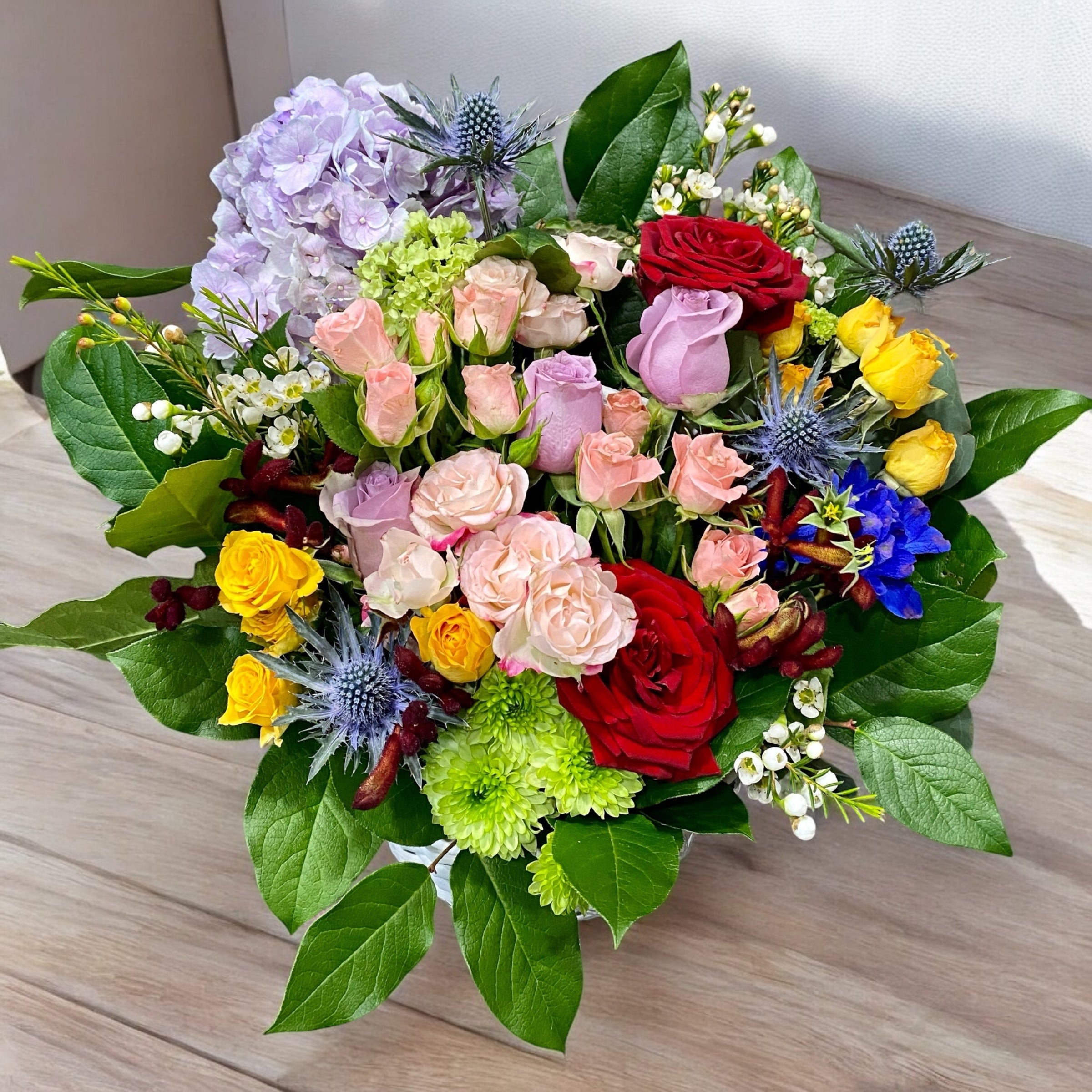 Box with flowers - hydrangea and mini roses