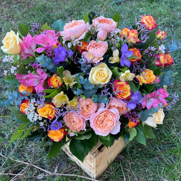 Colorful floral arrangement in a box