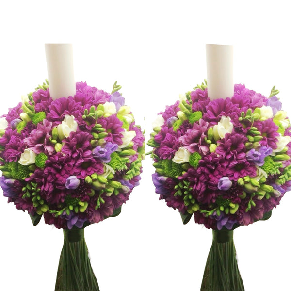 Purple daisies and freesia wedding candles