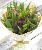 Bouquet of 15 yellow tulips and wax flowers