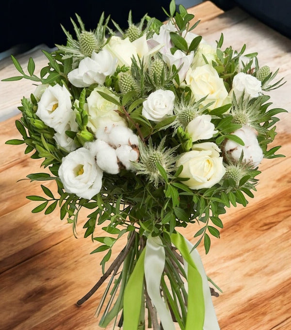 Bouquet with cotton flowers, eryngium and roses