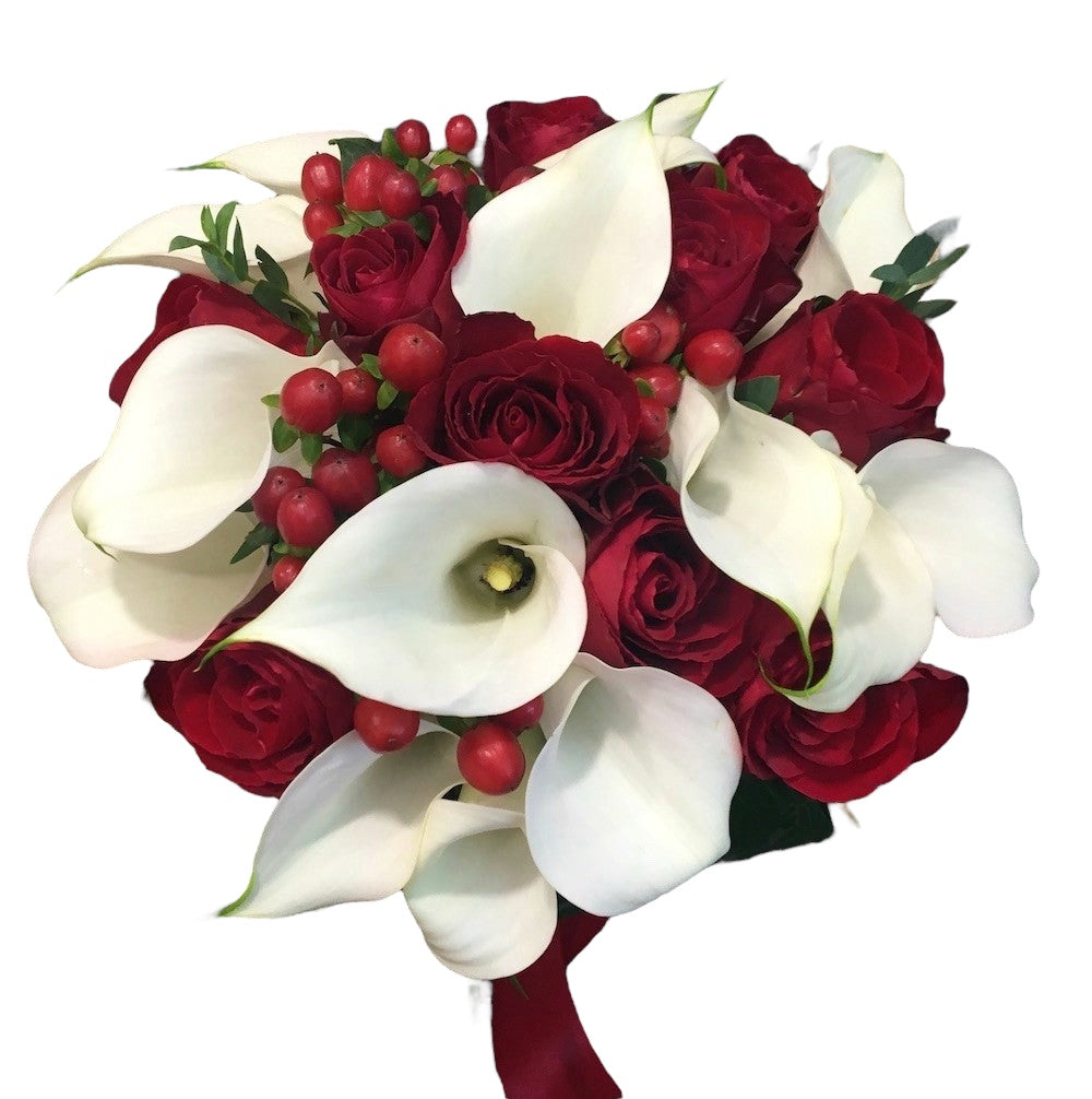 Bridal bouquet with roses, calla and hypericum