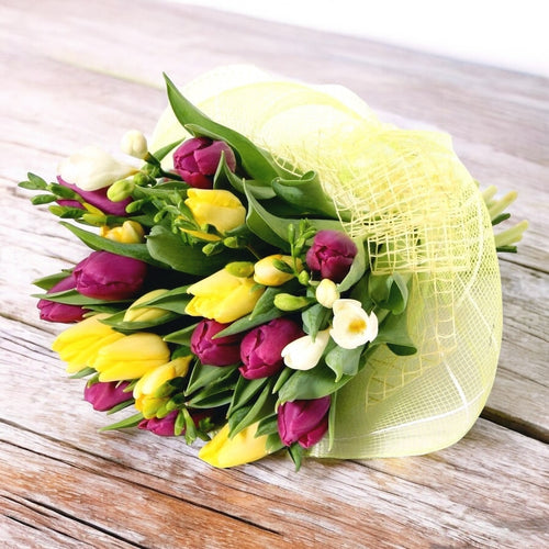 Scented bouquet of tulips and freesias