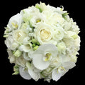 Wedding bouquet with roses, lisianthus and phalaenopsis orchids