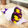 Spring bouquet of 21 purple and yellow tulips