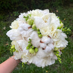 Bridal bouquet of peonies and cotton