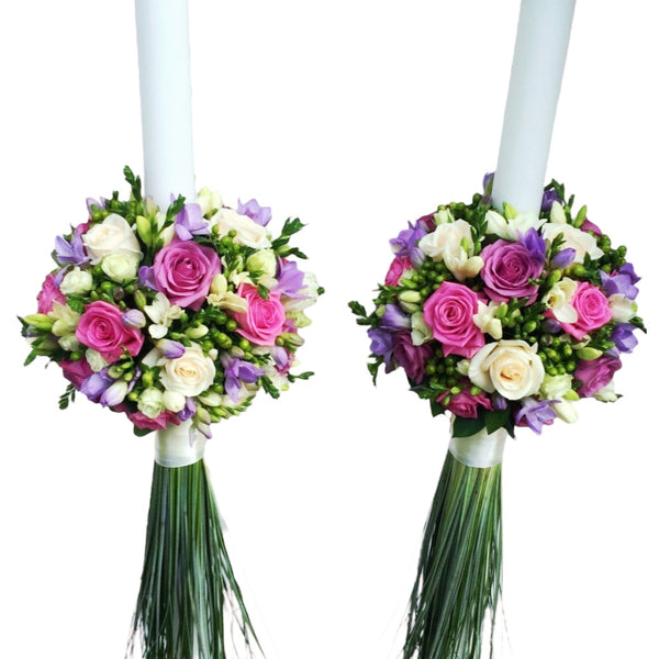 Wedding candles with roses, hypericum and freesia