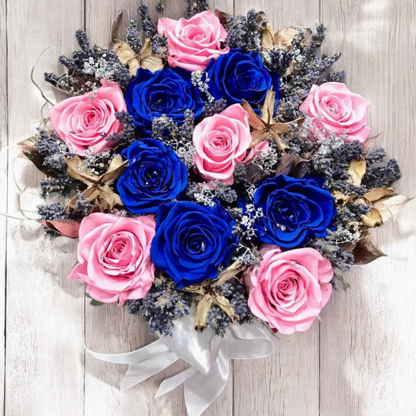 Cryogenic blue roses in a round box