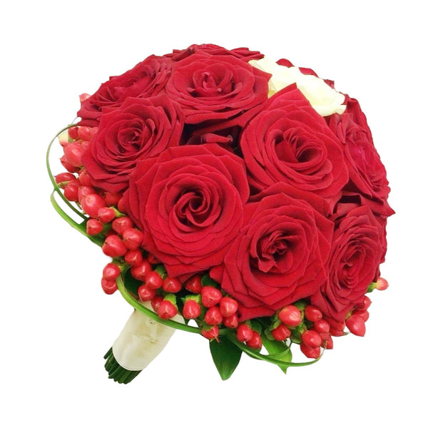 Wedding bouquet of roses and red hypericum