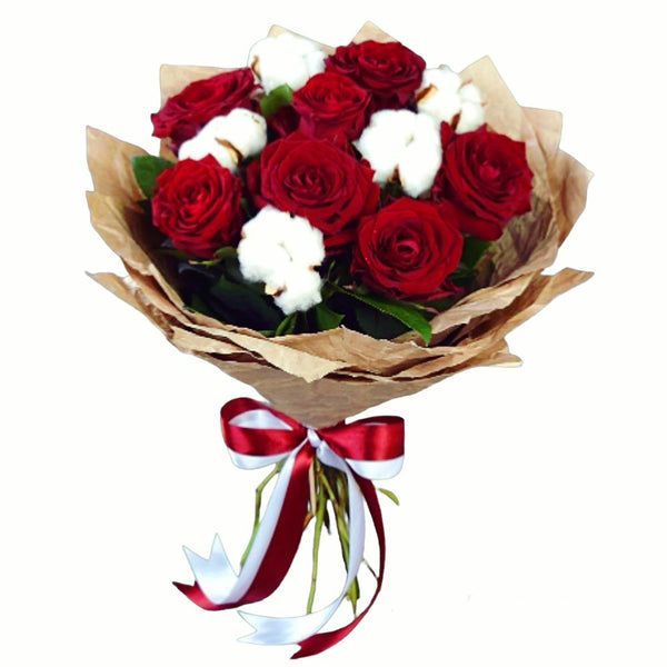 Bouquet of red roses and cotton flowers - love and luck