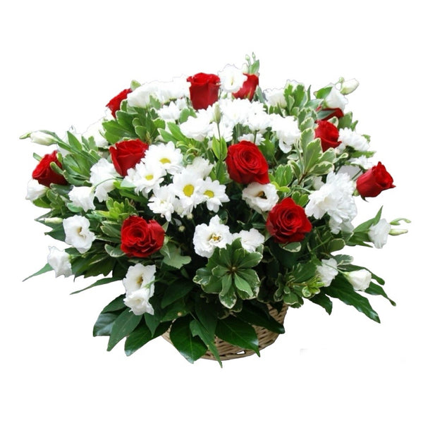 Basket with red roses and daisies