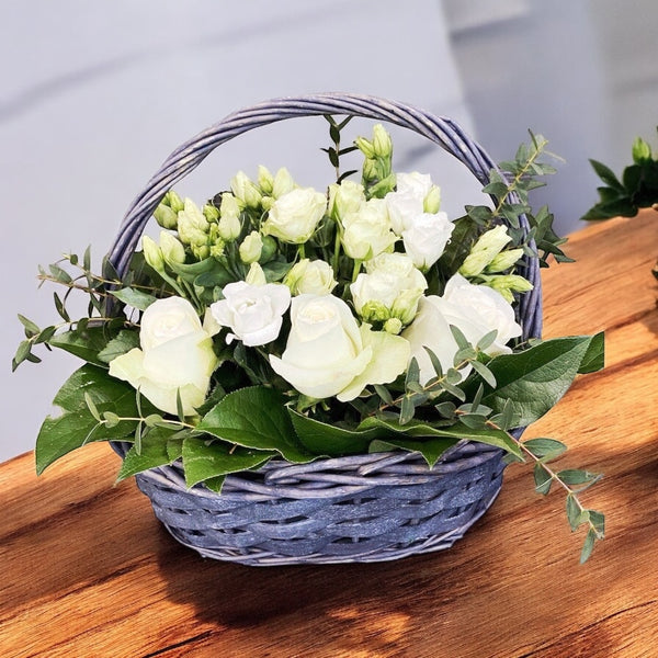 Basket with white flowers