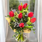 Bouquet of 7 yellow tulips and a butterfly