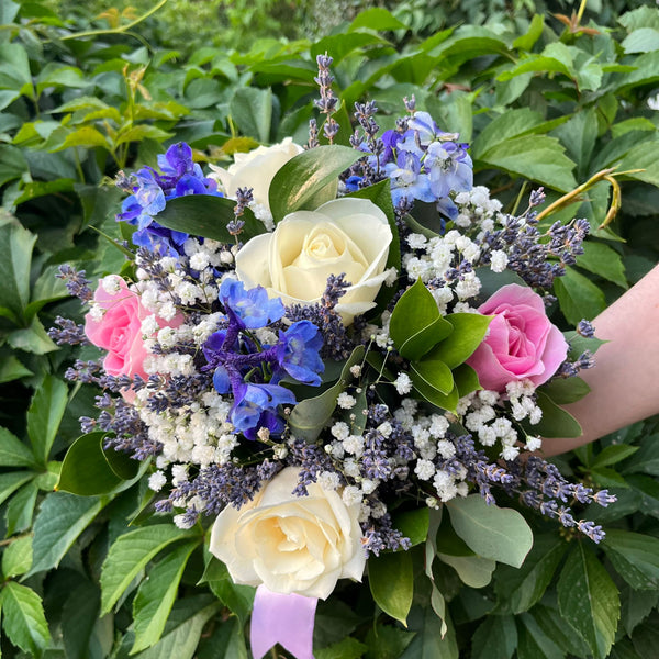 Bridesmaid bouquet roses and delphinium