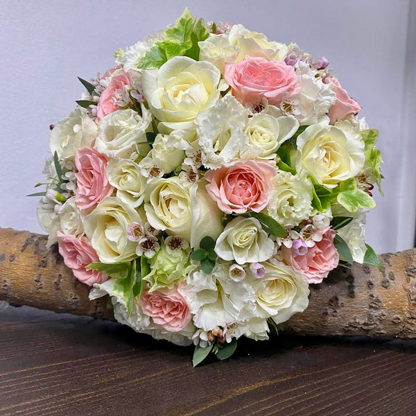 Wedding bouquet pink roses and cotton