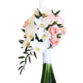 Baptism candle made of pink roses and phalaenopsis orchids