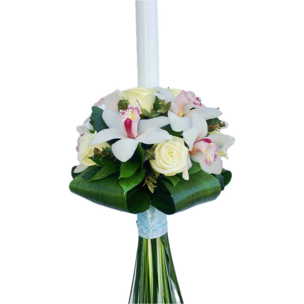 Baptism candle, cymbidium orchids and roses