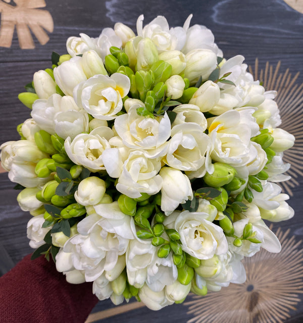Wedding bouquet of fragrant white freesias
