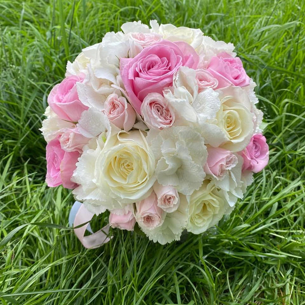White hydrangea and pink roses wedding bouquet
