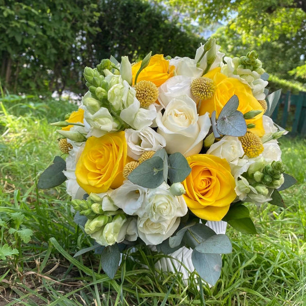 Mathiola, craspedia and freesia wedding bouquet