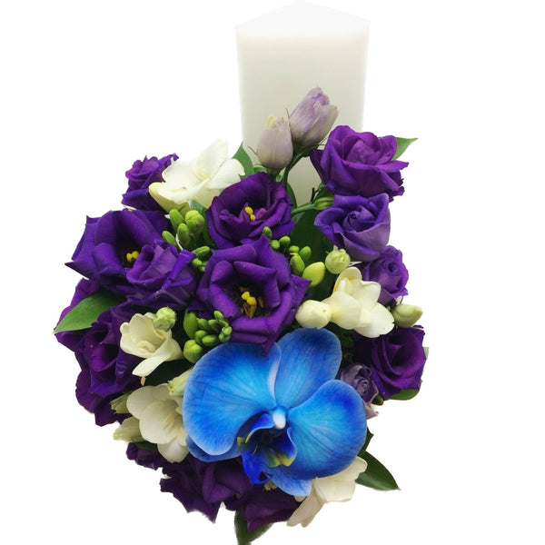 Short christening candle for a boy, purple and blue flowers