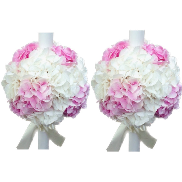 Wedding candles made of white and pink hydrangeas