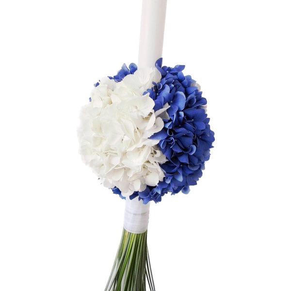 Baptism candle made of white and blue hydrangea