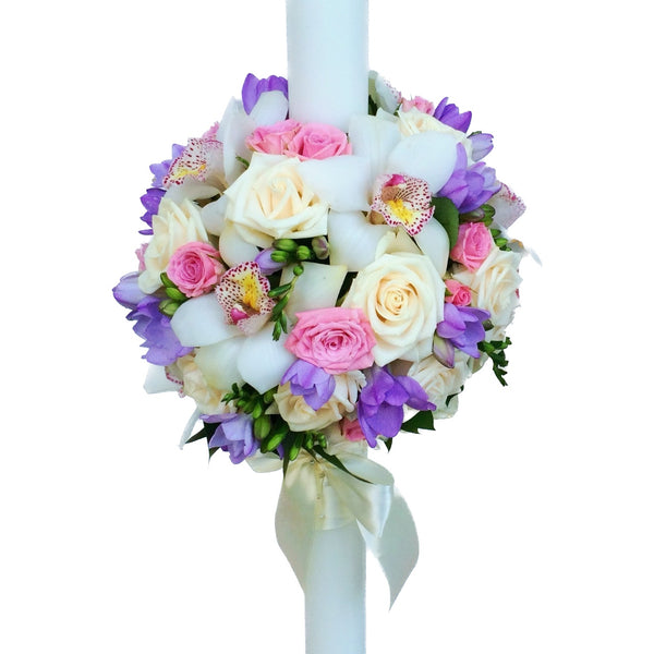 Spherical christening candle orchids, freesias and roses
