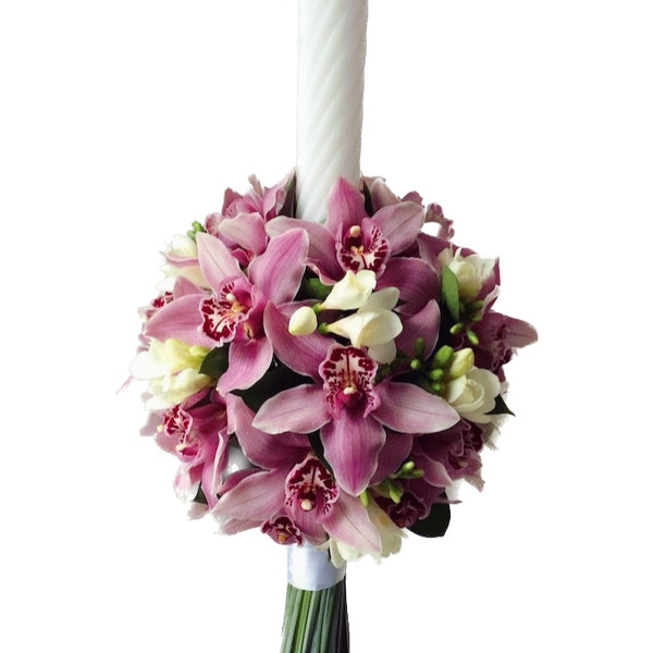 Baptism candle with pink orchids and white freesias