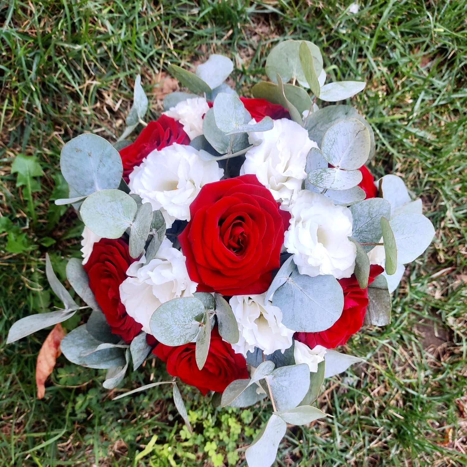 Cream and purple lisianthus bridal bouquet