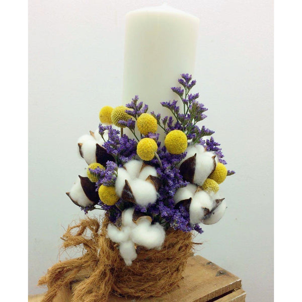 Short, rustic wedding candles with cotton and craspedia