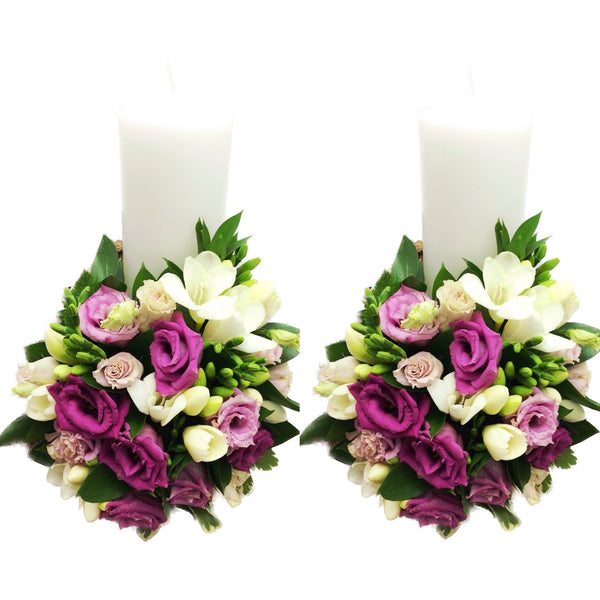 Short pink lisianthus and white freesia wedding candles