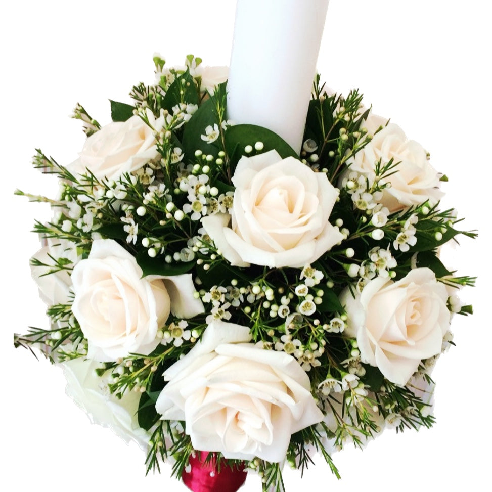 Baptism candle made of cream roses and wax flowers