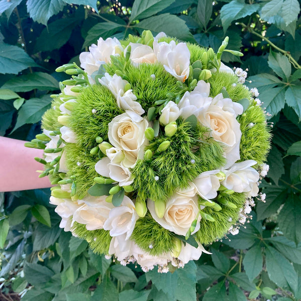 Wedding bouquet with dianthus green trick and freesias
