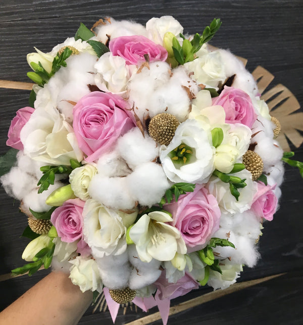 Cotton wedding bouquet and pink roses