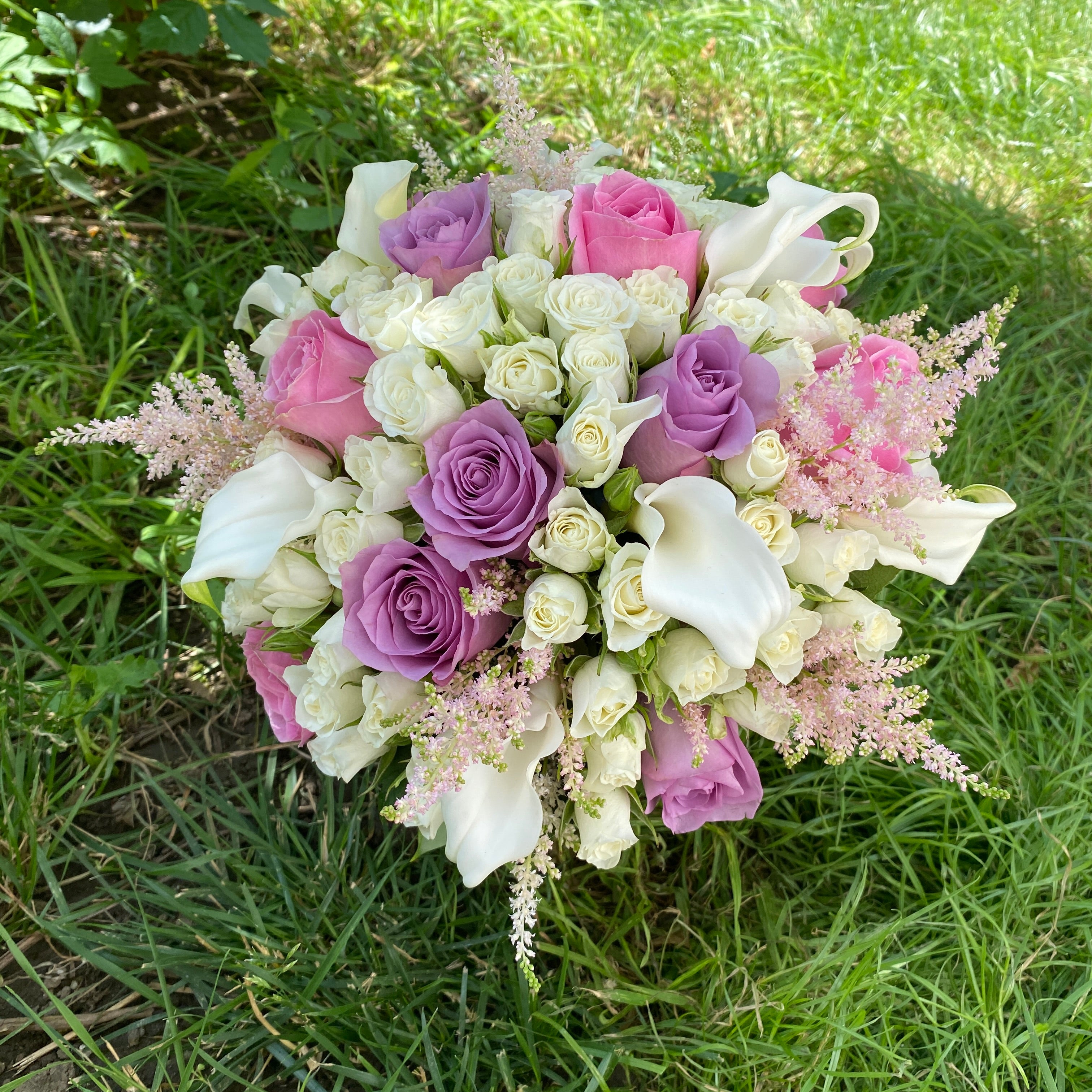 Special bridal bouquet with roses and path