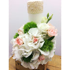 Short baptism candle with lisianthus, mini roses and hydrangea