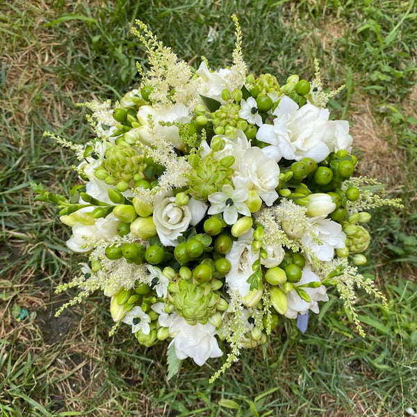 Fresh wedding bouquet, in shades of green and white