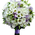 Baptism candle white lisianthus and purple freesia