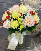 Bridal bouquet of roses, freesia and hypericum