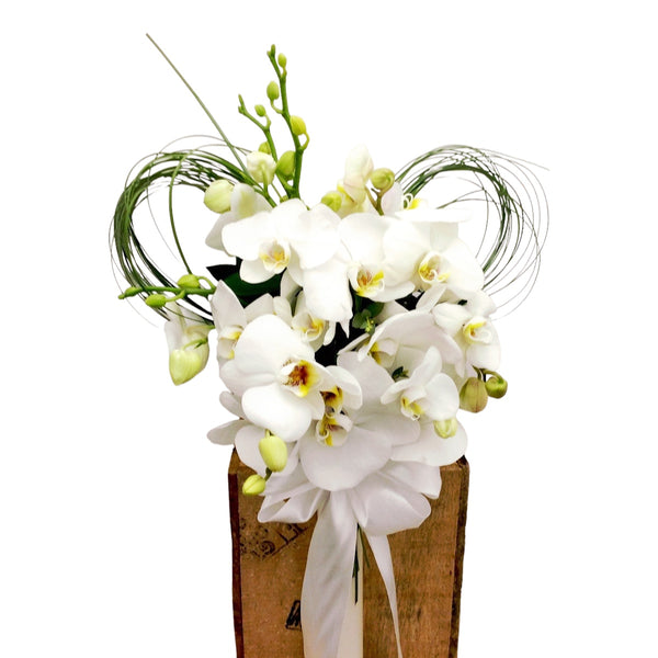 Phalaenopsis orchid baptism candle - elegant floral arrangement
