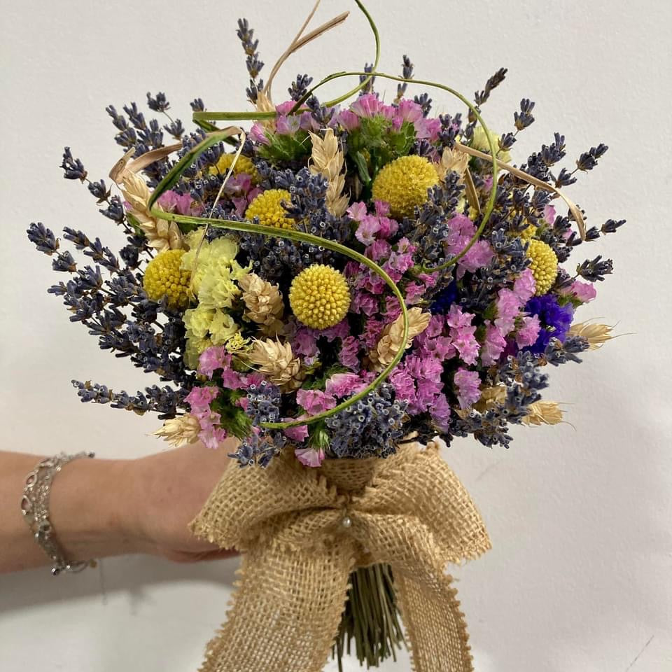 Rustic wedding bouquet of lavender and ears of wheat