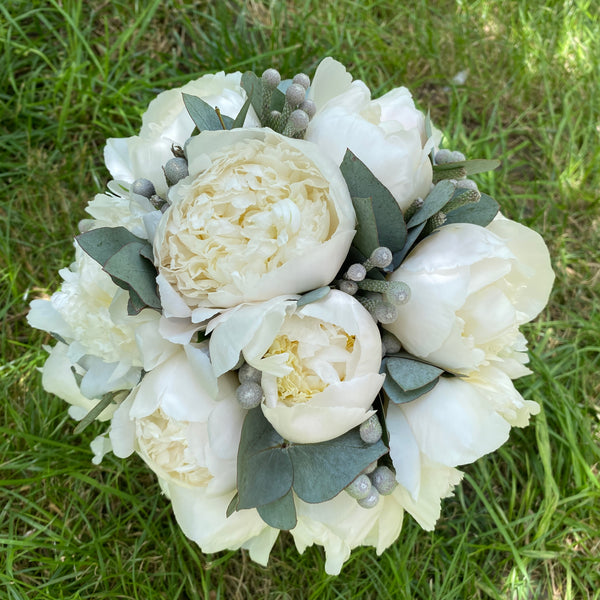 Wedding bouquet of 15 white and brown peonies
